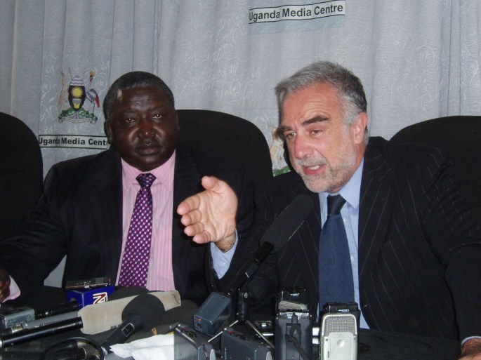 Moreno Ocampo Uganda Minister for International Affairs Henry Okello Oryem and ICC prosecutor Luis Moreno-Ocampo addressiing the press in Kampala on July 13. Rosebell Kagumire photo.