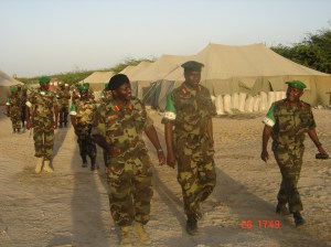 Lt.Gen Katumba Wamala, Uganda's army Land Forces Commander (L) while visiting troops in Mogadishu last year. AMISOM photo