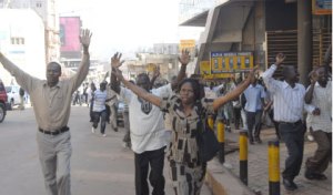 cover1_1 People trying to find safe haven during the riots. Daily Monitor photo.