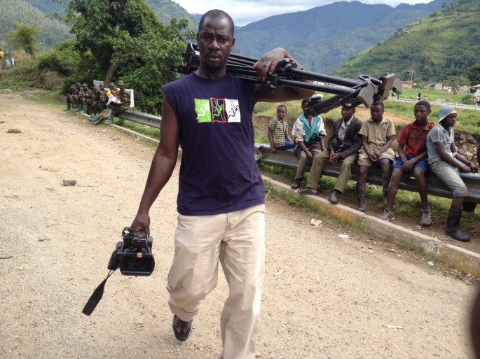 Hillary while covering floods in Kasese, Western Uganda a few months ago.