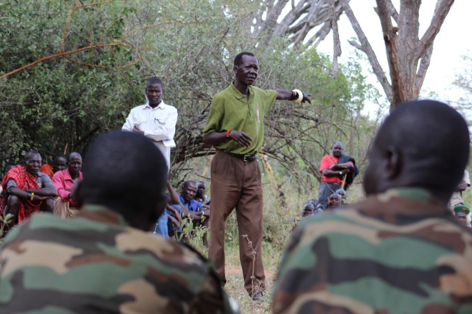 Soldiers listen in during the dialogue